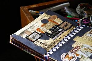 Vintage Desk Top Setting With Old Books And Typewriter photo