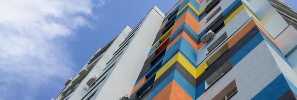 New multy storey residential building and blue sky photo