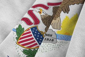 Illinois US state flag with big folds waving close up under the studio light indoors. The official symbols and colors in banner photo