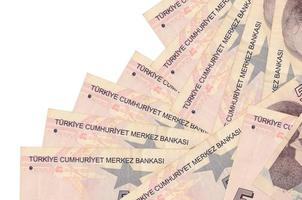 5 Turkish liras bills lies in different order isolated on white. Local banking or money making concept photo