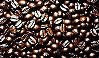 Freshly roasted coffee beans. can be used as background. Coffee composition. photo