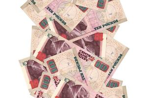 10 Egyptian pounds bills flying down isolated on white. Many banknotes falling with white copyspace on left and right side photo