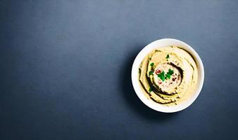 Healthy food. Traditional freshly made organic hummus. photo