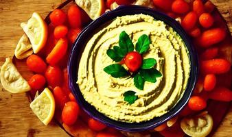 Healthy food. Traditional freshly made organic hummus. photo