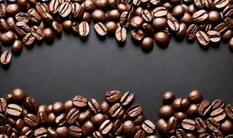 Freshly roasted coffee beans. can be used as background. Coffee composition. photo