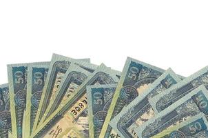 50 Nepalese rupees bills lies on bottom side of screen isolated on white background with copy space. Background banner template photo