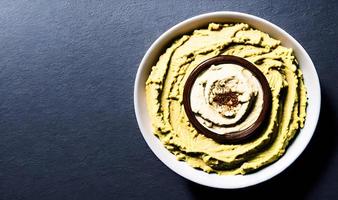 Healthy food. Traditional freshly made organic hummus. photo