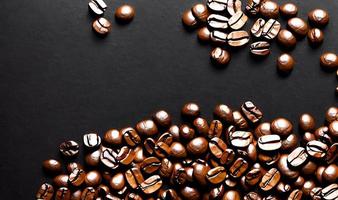 Freshly roasted coffee beans. can be used as background. Coffee composition. photo