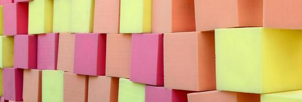 Wall of paralon soft cubes in dry pool, trampoline in the childrens center photo