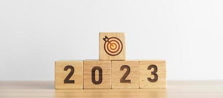 2023 block with dartboard icon. Goal, Target, Resolution, strategy, plan, Action, mission, motivation, and New Year start concepts photo