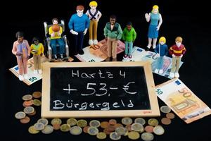 On January 1st, 2023, unemployment benefit Hartz 4 will be replaced by higher citizen benefits translation Buergergeld in Germany photo