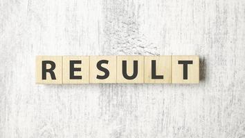 result word on wooden blocks and white background photo