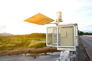 Solar cell system to store and saving the power to use with Rain gauges and flood warnings system near the bridge. photo