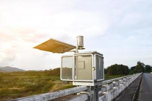 Solar cell system to store and saving the power to use with Rain gauges and flood warnings system near the bridge. photo