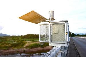 Solar cell system to store and saving the power to use with Rain gauges and flood warnings system near the bridge. photo