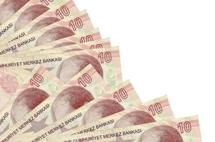 10 Turkish liras bills lies isolated on white background with copy space stacked in fan close up photo