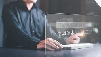 A young man searches for information that interests him through online websites, keyword search concept to find information from online websites, website link search, SEO, Search Engine Optimization. photo