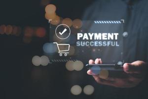 successful payment businessman through smart phones with modern technology,wallet app, banking and online shopping,Wireless financial transactions,Shopping service on The online web,Consumer society photo