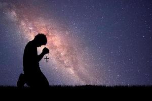 Christian men pray to God for good luck. concept of prayer photo
