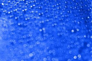 abstract red background with bokeh and  drops of water photo