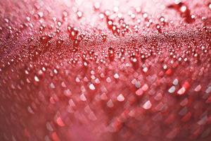 abstract red background with bokeh and  drops of water photo