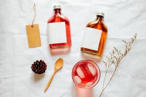 Cold brew tea branding mockup set with glass of iced tea and tag card photo