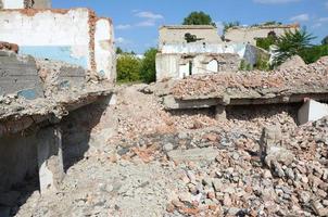 Collapsed industrial multistorey building in daytime photo