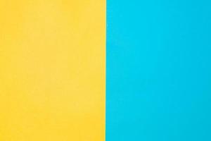 Top view texture paper background. Yellow-blue colored backdrop. Two vertical backgrounds photo