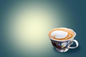 cup of mochaccino coffee on blue light gradient color photo