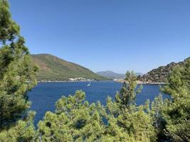 Sea, mountains and pine trees, beautiful landscape. Marmaris, Turkey. photo