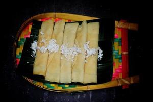 Asian Traditional Food Patishapta Pitha. Location - Bogura, Bangladesh. Date - 24 November 2022 photo