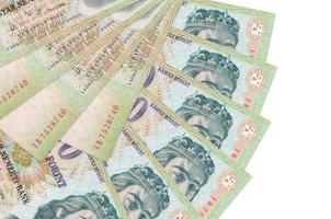 200 Hungarian forint bills lies isolated on white background with copy space stacked in fan shape close up photo