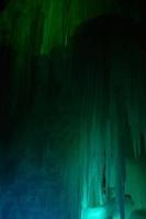 Large blocks of ice frozen waterfall or cavern background photo