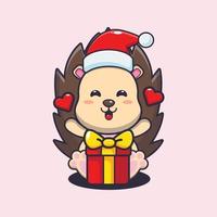Cute hedgehog happy with christmas gift. Cute christmas cartoon illustration. vector