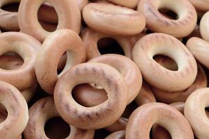 Close-up photo of fresh yellow bagels. A popular kind of flour products. One of the traditional Russian treats for tea