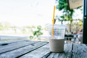 Empty ice coffee in front of coffee shop photo