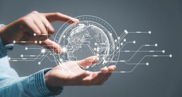 Business global internet connection application technology and digital marketing, Financial and banking, Digital link tech, big data. woman Hand holding virtual Global Internet connection metaverse. photo