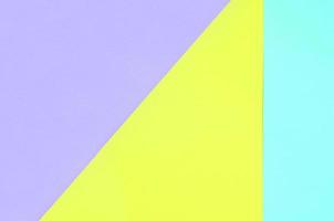 Texture background of fashion pastel colors. Violet, yellow, and blue geometric pattern papers. minimal abstract photo