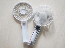 A portable mini fan that was dismantled because it was damaged. photo