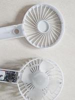 A portable mini fan that was dismantled because it was damaged. photo