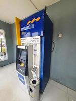 Jakarta, Indonesia in July 2022. This is a photo of an Automated Teller Machine or ATM from Bank Mandiri.