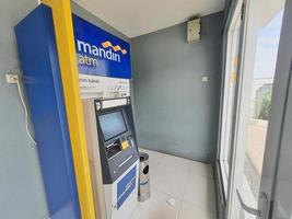 Jakarta, Indonesia in July 2022. This is a photo of an Automated Teller Machine or ATM from Bank Mandiri.