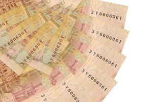 2 Ukrainian hryvnias bills lies isolated on white background with copy space stacked in fan shape close up photo