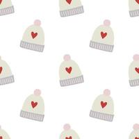 Cute knitted hats with red hearts, seamless pattern in vector. Christmas background. vector