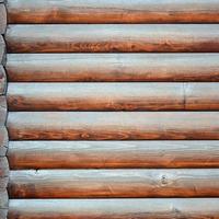 Hewn timber. Rustic log wall horizontal timber background photo