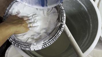 Pouring Glaze in a Ceramic Workshop video