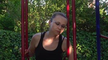 Young Woman Alone on Swing video