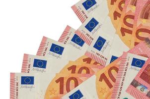 10 euro bills lies in different order isolated on white. Local banking or money making concept photo