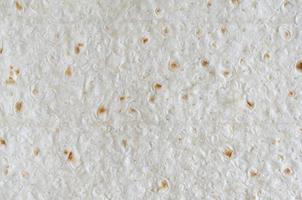 Homemade flat pita bread Turkish lavash background texture top view photo