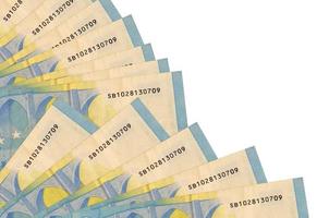 20 euro bills lies isolated on white background with copy space stacked in fan close up photo